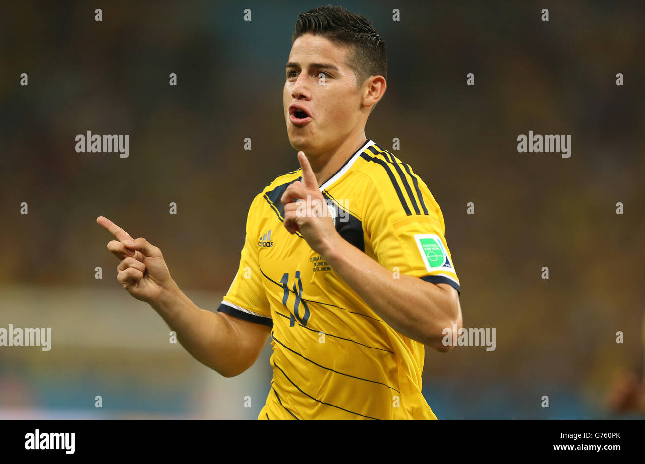 Colombia's James Rodriguez celebrates scoring their first goal of the game during the FIFA World Cup, Round of 16 match at the Estadio do Maracana, Rio de Janeiro, Brazil. Stock Photo