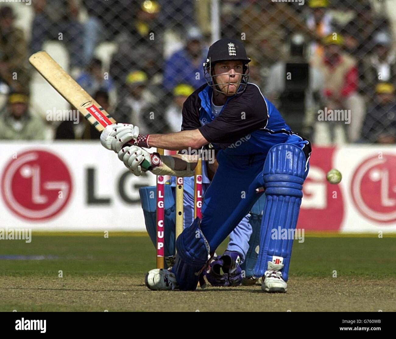 England's Nick Knight reverse sweeps the ball for four runs, during the fifth One-Day International at the Feroz Shah Kotla stadium, New Delhi, India. Stock Photo