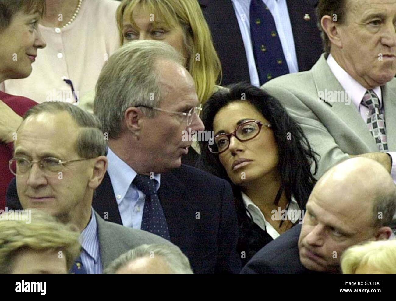 England's soccer team manager Sven-Goran Eriksson with his partner Nancy Dell'Olio (R) watching the Davis Cup match between Great Britain's Tim Henman and Sweden's Jonas Bjorkman in the opening round of their World Group match. * ... at the National Indoor Arena, Birmingham. 19/04/02 England coach Sven Goran Eriksson with his former partner Nancy Dell'Olio (right). According to the daily Mirror the England supremo has formed a friendship with television presenter Ulrika Jonsson. Ms Jonsson's agent Melanie Cantor said neither she nor Ulrika would comment and Paul Newman, head of Communications Stock Photo