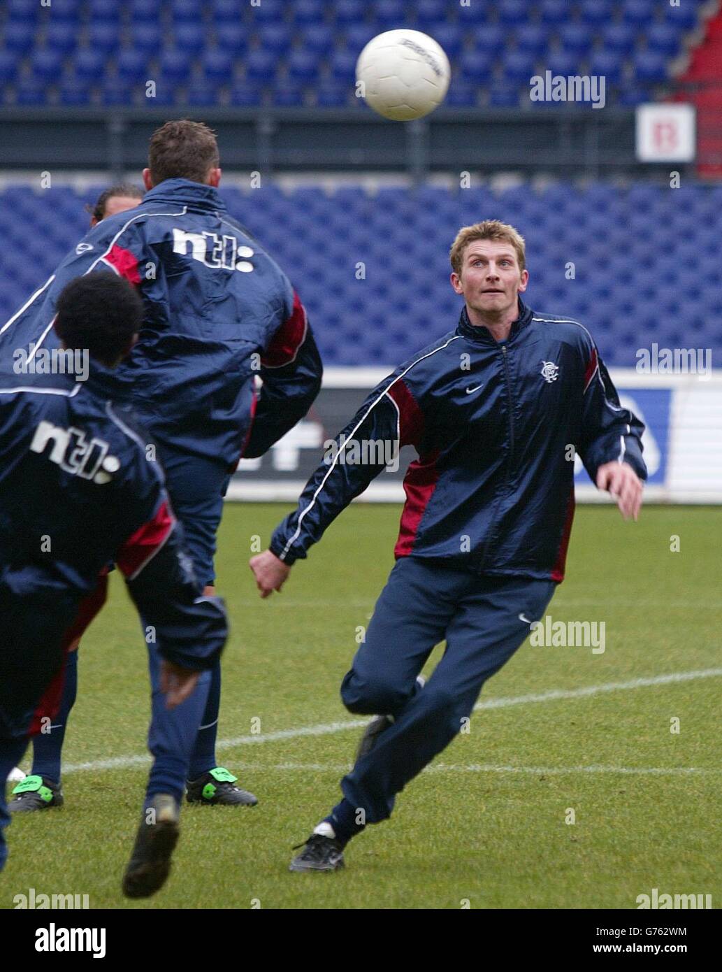 Rangers' Tore Andre Flo (right) during a training session at Feyenoord Stadium before their UEFA cup clash with Feyenoord tomorrow. Stock Photo