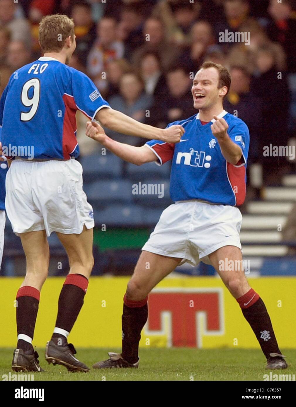 Rangers' Christian Nerlinger (right) celebrates his goal against Partick Thistle with teammate Tore Andre Flo in the Tennents Scottish Cup semi-final at Hampden Park, Glasgow. Stock Photo