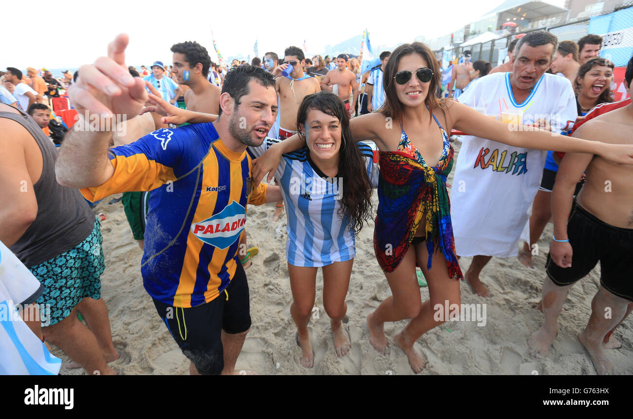 Soccer - FIFA World Cup 2014 - Fan Camp - Copacabana Beach. Argentina fans celebrate their victory over Switzerland on Copacabana Beach, Rio de Janeiro, Brazil. Stock Photo