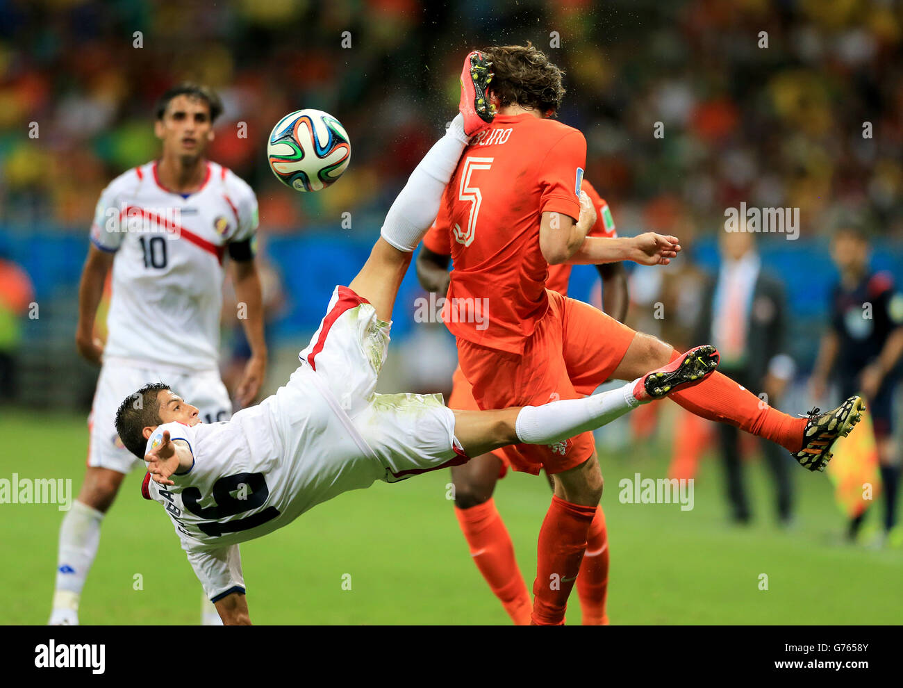 Costa Rica's Cristian Gamboa (left) and Netherland's Daley Blind battle for the ball Stock Photo