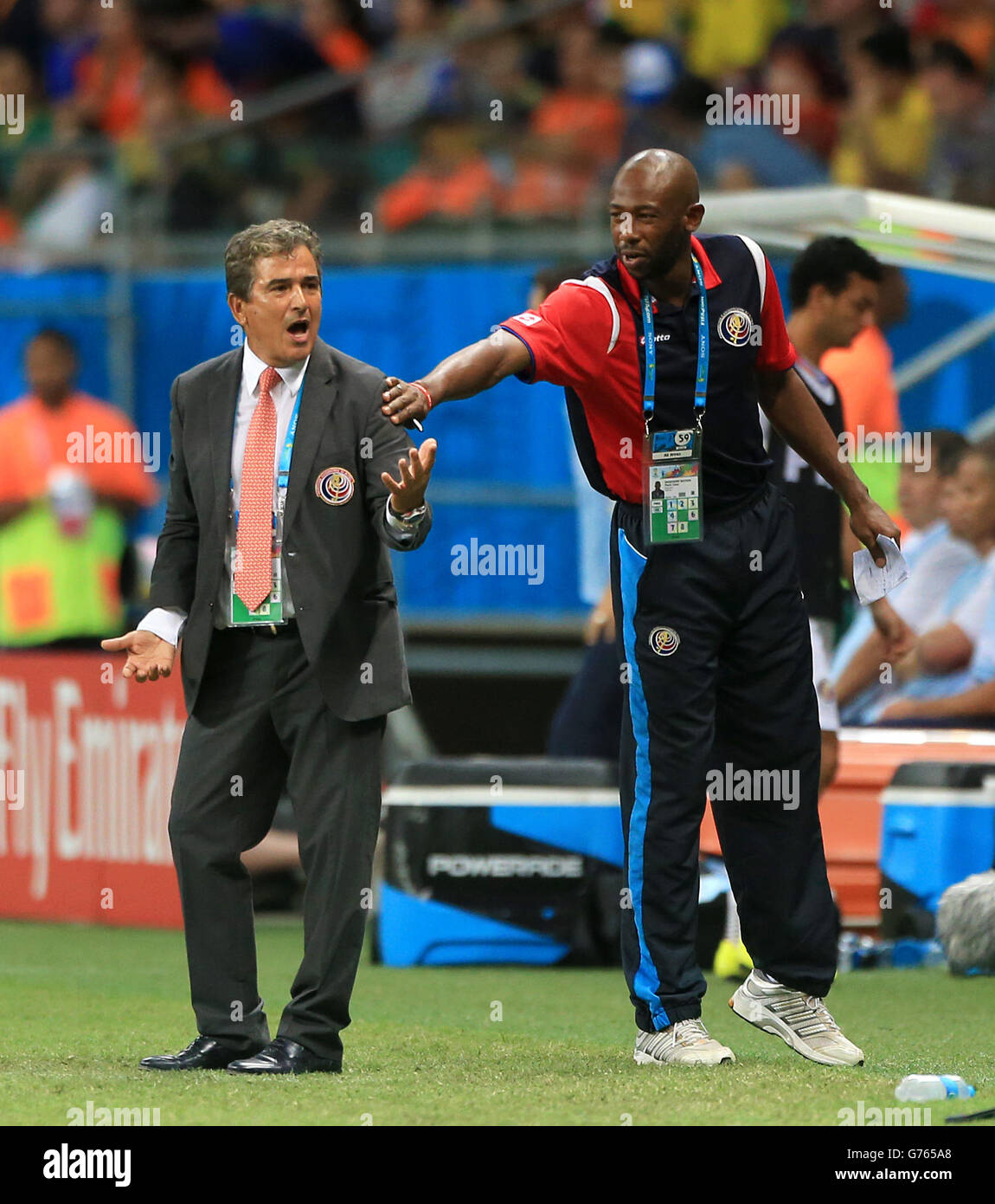 Costa Rica manager Jorge Luis Pinto argues with the Netherlands bench as assistant Paulo Wanchope tries to calm him down Stock Photo