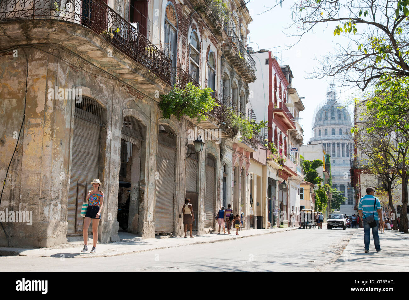 Cuban street with the Capitol building visible in the background Stock Photo