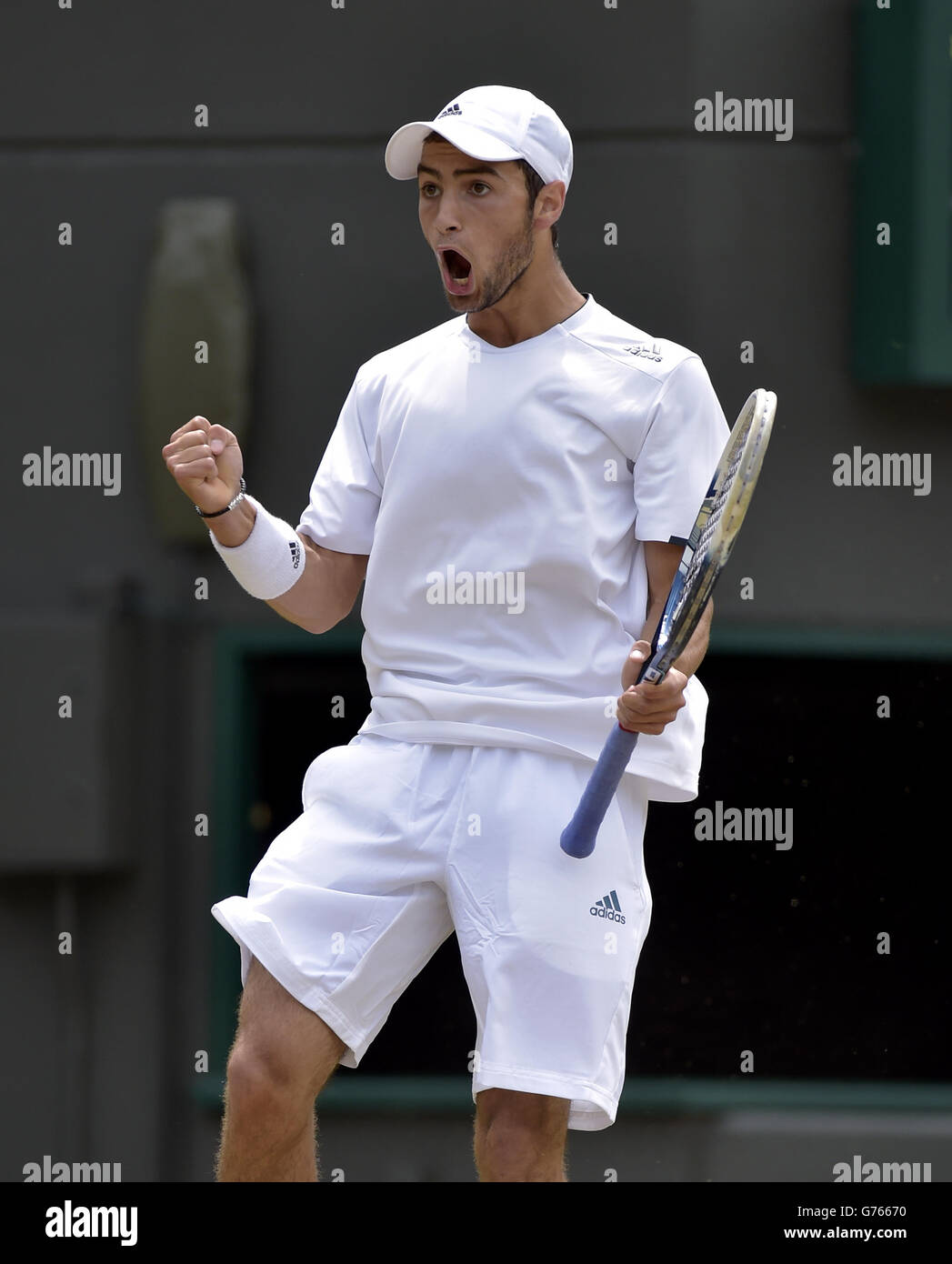 Tennis - 2014 Wimbledon Championships - Day Fourteen - The All England Lawn Tennis and Croquet Club. USA's Noah Rubin in action against compatriot Stefan Kozlov in the Boys singles final Stock Photo