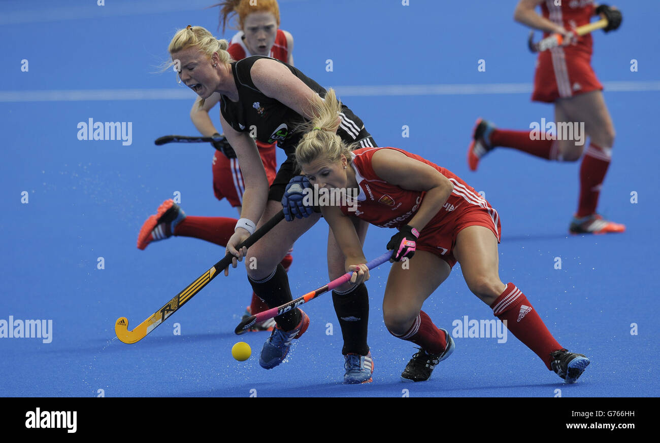 England's Georgie Twigg is challenged by Wales' Elie Mumford during the London Cup at the Lee Valley Hockey and Tennis Centre, Queen Elizabeth Park, Stratford. Stock Photo