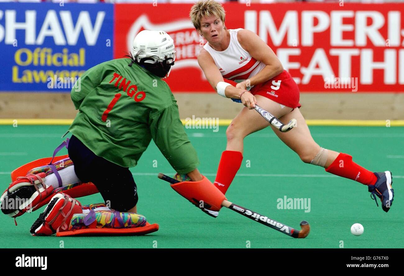 England's Leisa King with Indian goalkeeper Tingongleima Kshetrimayum, during the Hockey Final at the Belle Vue, Stadium at the XVII Commonwealth Games, Manchester. Stock Photo