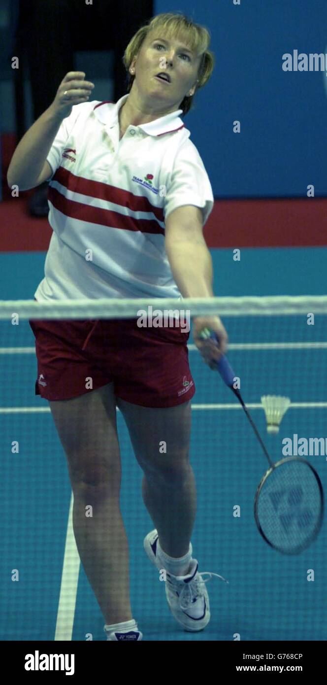 England's Tracey Hallam serves in the Badminton singles at the Bolton  Arena, during the Commonwealth Games Stock Photo - Alamy