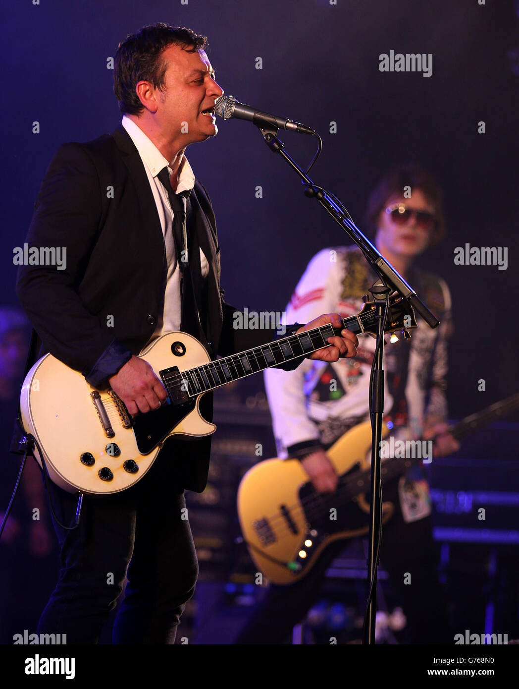 Manic Street Preachers James Dean Bradfield and Nicky Wire perform in the King Tuts Wah Wah Tent at the T in the Park festival, held at Balado Park in Kinross, Scotland. Stock Photo