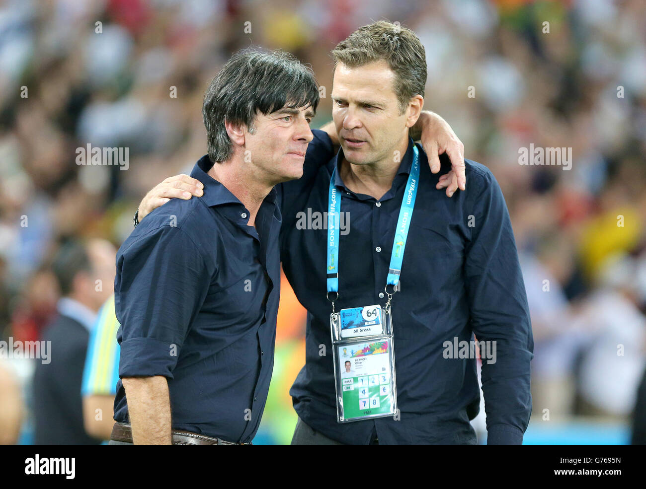 Soccer - FIFA World Cup 2014 - Final - Germany v Argentina - Estadio do Maracana. Germany manager Joachim Loew (left) embraces General Manager Oliver Bierhoff after the game. Stock Photo