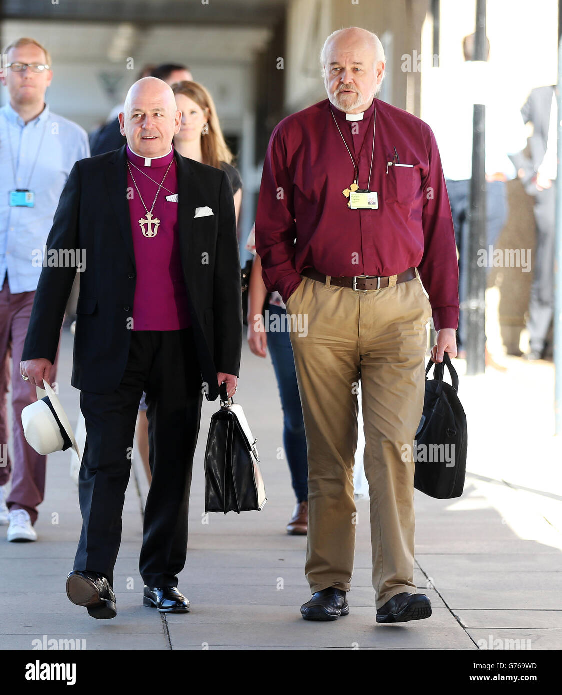 The Bishop of London Richard Chartres (right) arrives for the General Synod of Church of England meeting at The University of York. Stock Photo