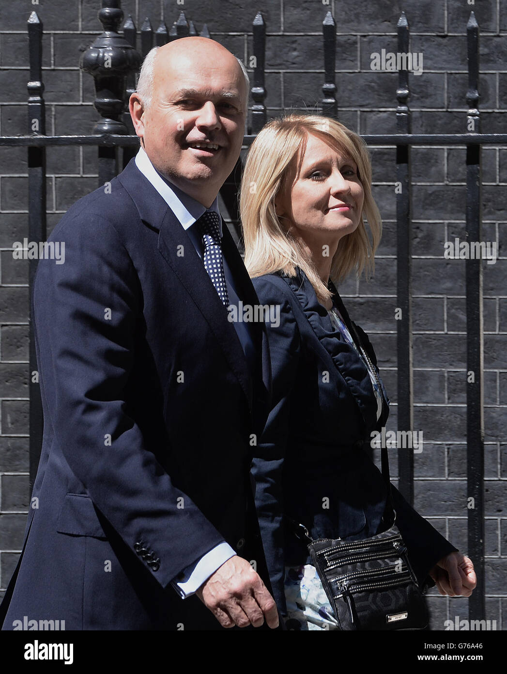 Secretary of State for Work and Pensions, Iain Duncan Smith and Employment Minister Esther McVey arrive at 10 Downing Street in London as David Cameron is putting the final touches to a reshuffle that is expected to see more women promoted into key positions. Stock Photo