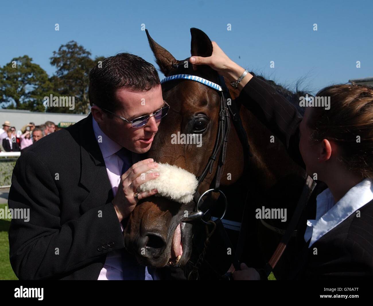 Mark Weld, son of trainer Dermot Weld kisses Vinnie Roe after winning the Jefferson Smurfit Memorial Irish St Leger at the Curragh in the Republic of Ireland. Stock Photo