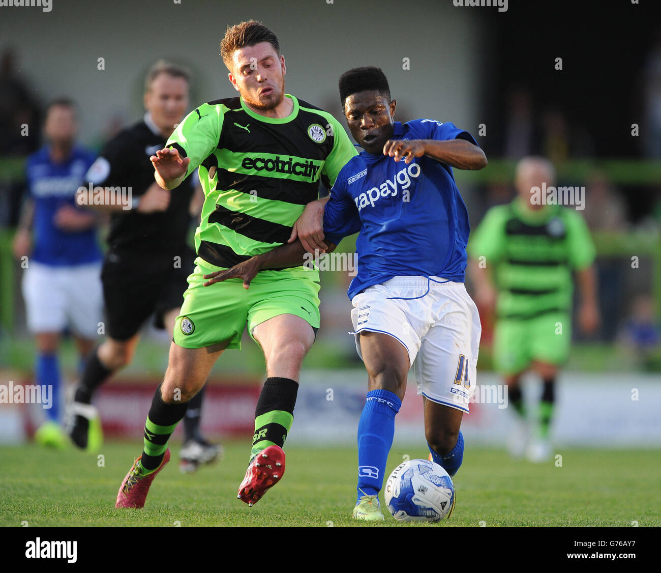 Forest Green Rovers' Sam Wedgbury (left) and Birmingham City's Koby Arthur  (right) battle for the ball Stock Photo - Alamy