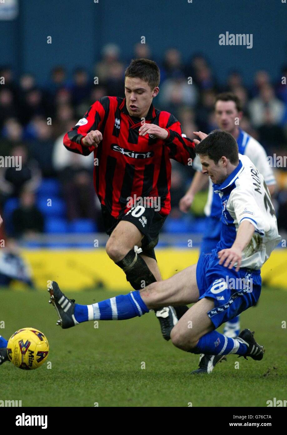 Oldham' Athletic's Paul Murray (R) and Brighton's Daniel b in action