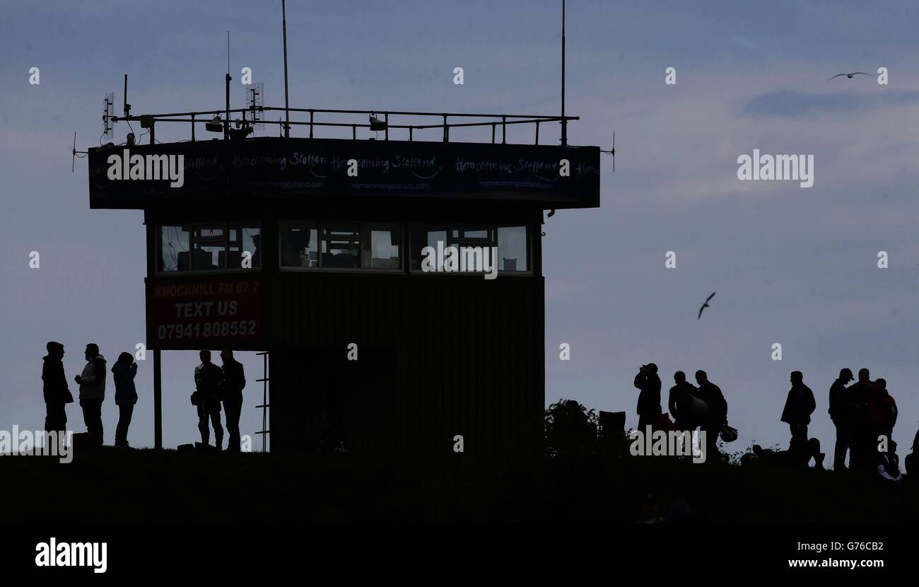Spectators watch the 2014 MCE Britsh Superbike Championship, Round 4, Race 12, in association with Pirelli during the MCE British Superbike Championship Race at Knockhill Racing Circuit, Fife. Stock Photo