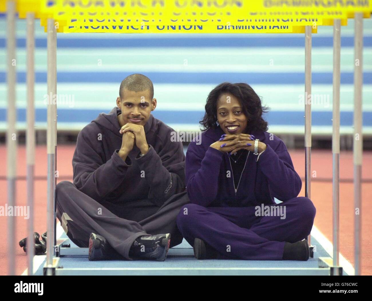 Dominican Republic 400m Hurdler Felix Sanchez (left) and Olympic Gold
