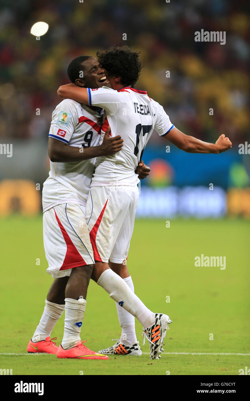 Costa Rica's Joel Campbell and Yeltsin Tejeda (right) celebrate winning the penalty shoot-out Stock Photo