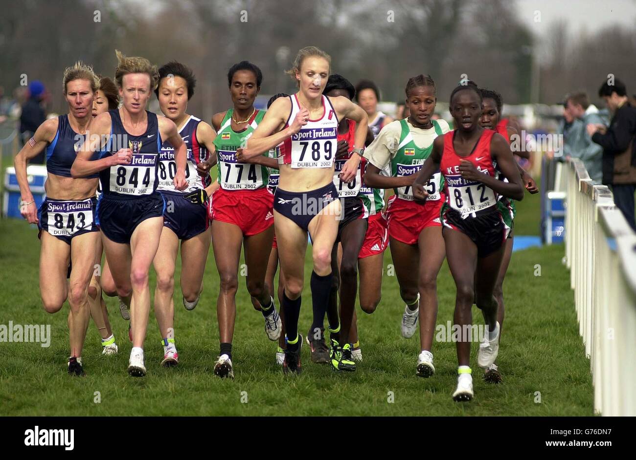 British athlete Paula Radcliffe (centre)) battles with American Deena Drossin (844) and and Kenyan Rose Cheruiyot (R) in the 30th IAAF World Cross-County Championship in Dublin. Radcliffe went on to successfully defend her title in a time of 26.55 with the American finishing nine seconds behind her in second place. Stock Photo