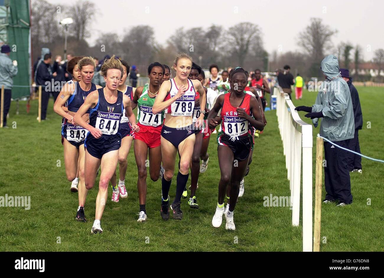 British athlete Paula Radcliffe (centre)) battles with American Deena Drossin (L) and and Kenyan Rose Cheruiyot (R) in the 30th IAAF World Cross-County Championship in Dublin. Radcliffe went on to successfully defend her title in a time of 26.55 with the American finishing nine seconds behind her in second place. Stock Photo