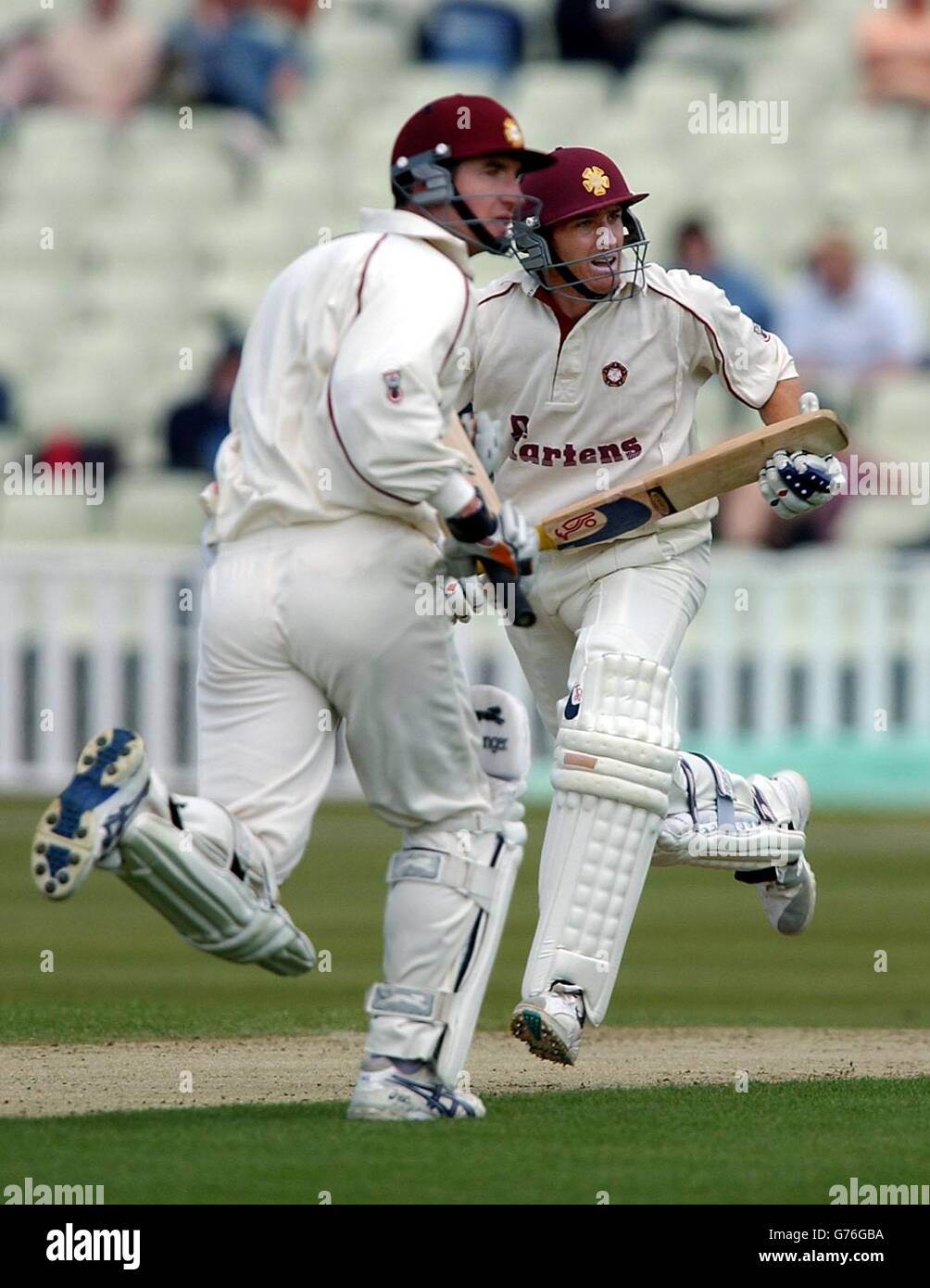 Northamptonshire's Michael Hussey (right) and Mal Loye on their way to a 123 run partnership during their Benson and Hedges Cup match against Warwickshire at Edgbaston, Birmingham. Stock Photo