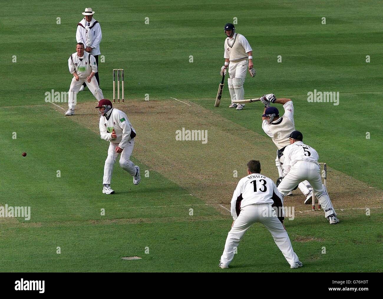 Yorkshire's Michael Lumb drives a delvery from Somerset's Keith Dutch, forcing Burns, the close fielder to take evasive action during his half cerntury in Yorkshire's second innings on the second day of the Frizzell County Championship match at the County Ground, Taunton. Stock Photo