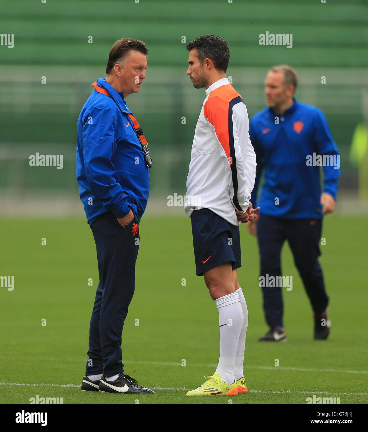 Netherlands manager Louis van Gaal gives his captain Robin van Persie a public dressing down during training ahead of the semi final of the World Cup against Argentina. Stock Photo
