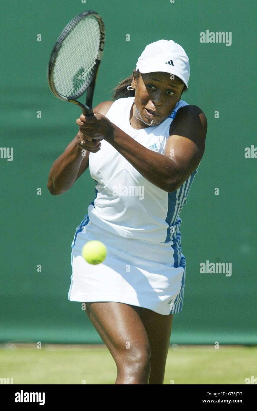 America's Chanda Rubin on her way to beating the 14th seed Iroda Tulyaganova the 14th seed from Uzbekistan at Wimbledon. Final score 6;3/6:1. Stock Photo