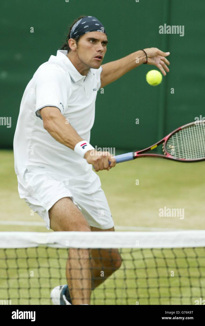 The Australian tennis player Mark Philippoussis in action against Nicolas  Kiefer of Germany on Court Two at Wimbledon during the tennis championships  Stock Photo - Alamy