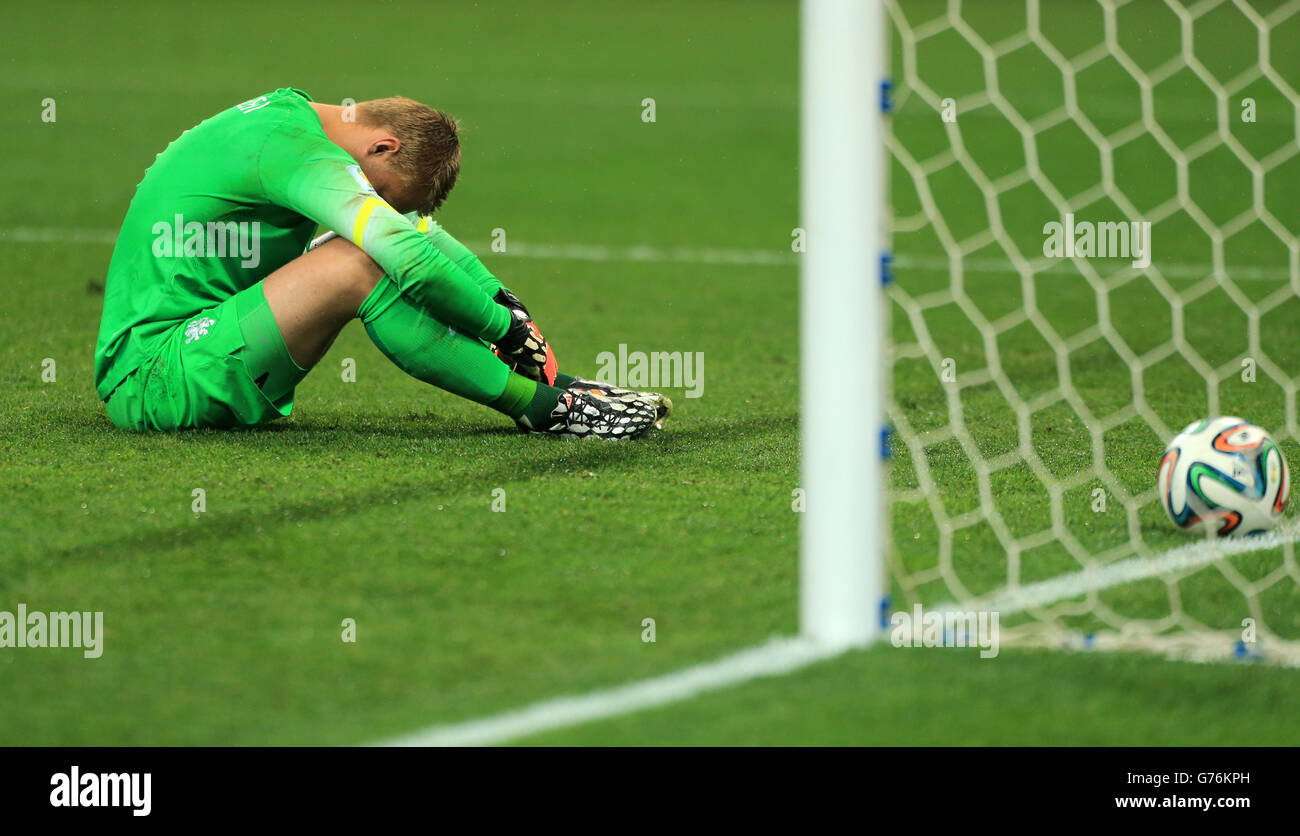 Soccer - FIFA World Cup 2014 - Semi Final - Netherlands v Argentina - Arena de Sao Paulo. Netherland goalkeeper Jasper Cillessen dejected as he fails to save a single penalty during the shootout Stock Photo