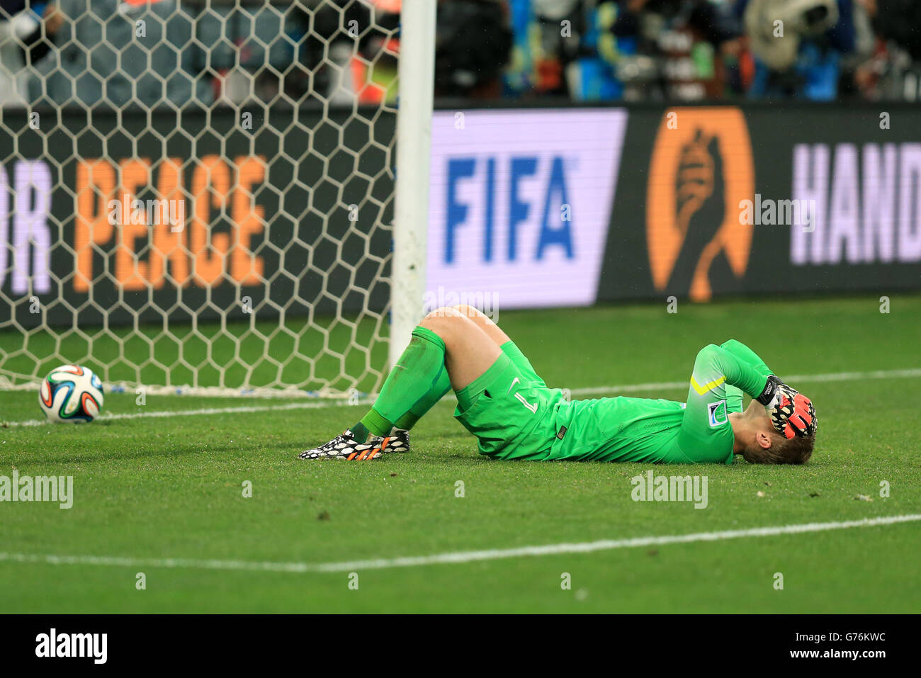 Netherlands goalkeeper Jasper Cillessen is left dejected following their loss in the penalty shoot-out during the FIFA World Cup Semi Final at the Arena de Sao Paulo, Sao Paulo, Brazil. Stock Photo