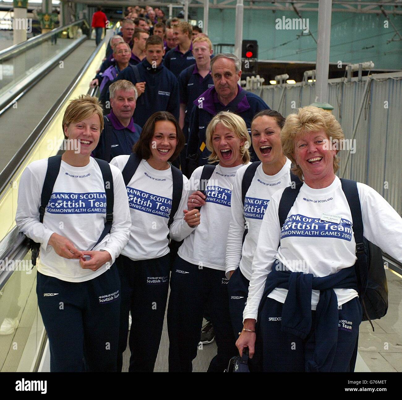 Members of the Scottish Commonwealth Games ladies hockey team arrive with the squad at Piccadilly Station in Manchester. The summer event - which runs between 25 July and 4 August - will attract 5,000 athletes from 72 countries. Stock Photo