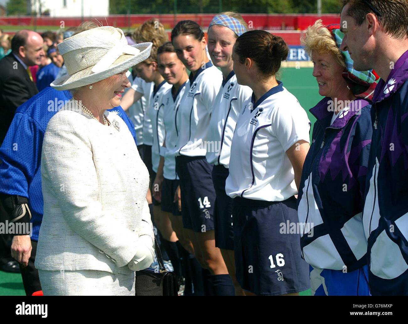 Britain's Queen Elizabeth II meets members of the Scotland ladies hockey team before their match against Australia, on the 1st day of the Commonwealth Games in Manchester. Stock Photo