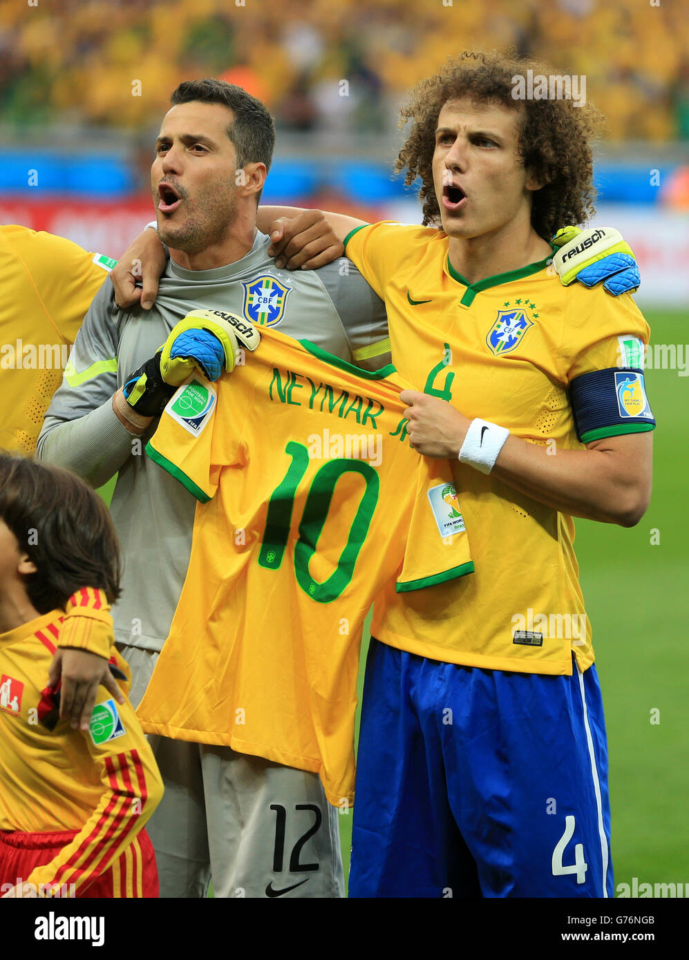 Brazil goalkeeper Julio Cesar and Brazil's David Luiz (right) hold up the  shirt of injured teammate Neymar during the anthems before the FIFA World  Cup Semi Final at Estadio Mineirao, Belo Horizonte,