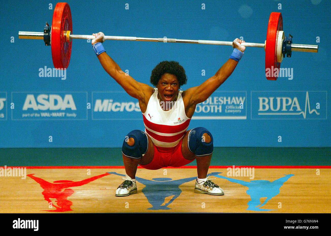 England's Annette Campbell lifts 80kg in the Snatch during the Commonwealth Games Womens 63kg Weightlifting, at the Manchester Arena in Manchester. Stock Photo