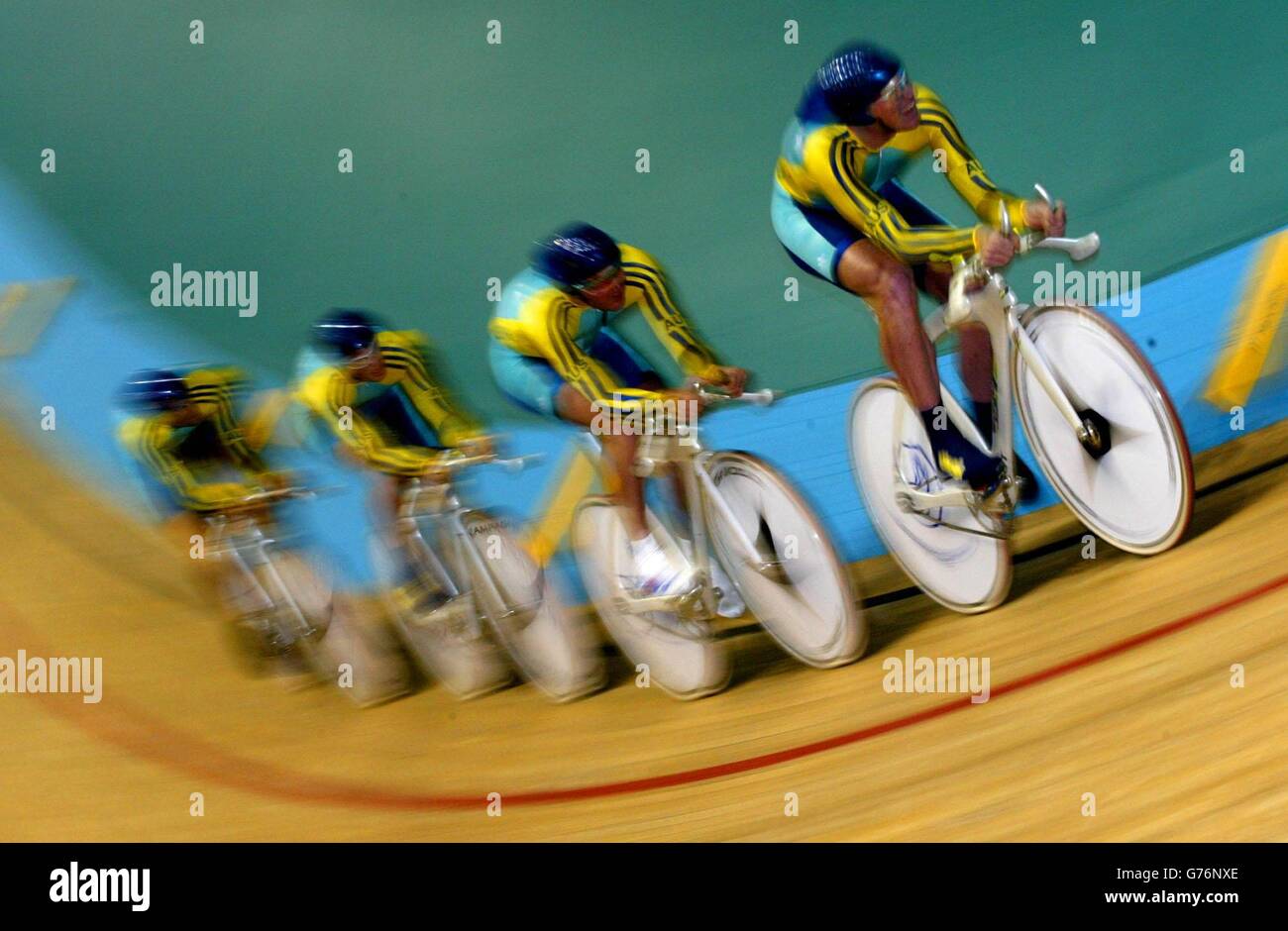The Australian Mens 4000 metre pursuit team on route to setting a new World record as they clinched Gold by beating England in the final at the Commonwealth Games in Manchester. Stock Photo