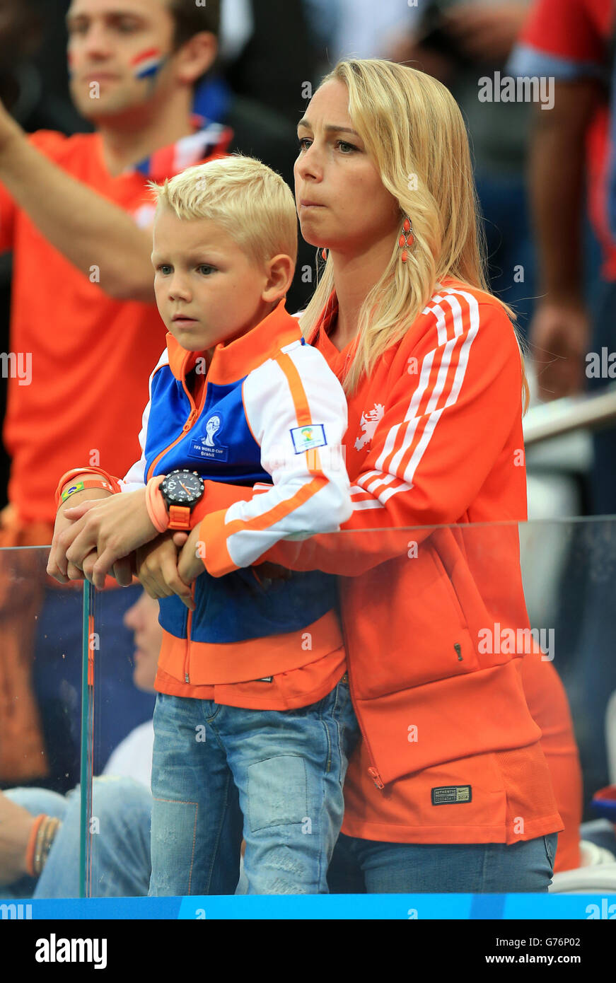 Soccer - FIFA World Cup 2014 - Semi Final - Netherlands v Argentina - Arena de Sao Paulo. Wife of Netherland's Arjen Robben Bernadien Eillert with son Luka in the stands Stock Photo