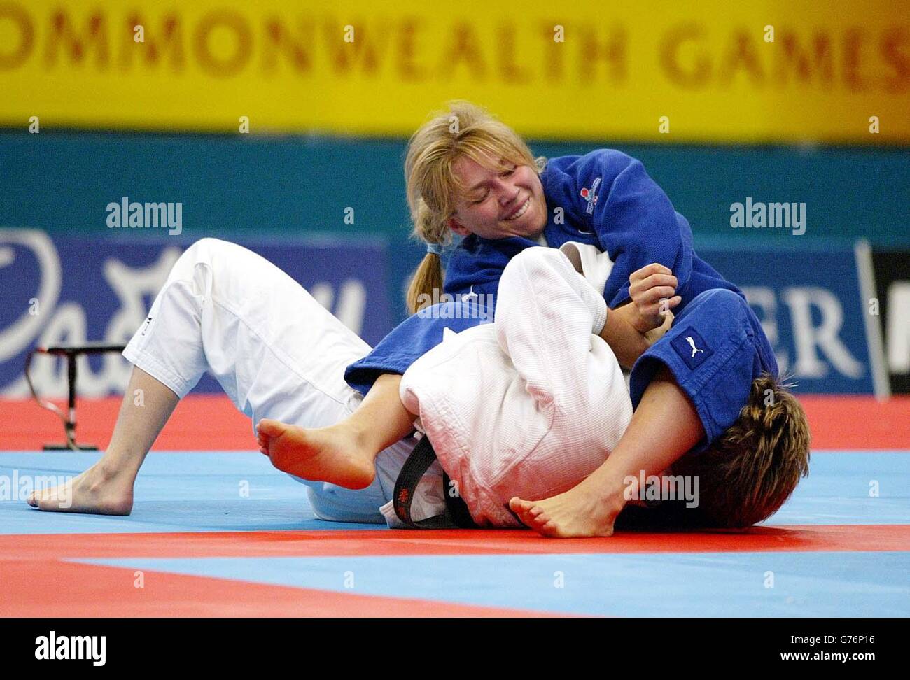 England S Michele Rogers Blue Beats Jo Melen Of Wales To Win The Under 78 Kg Judo Gold Medal At The Commonwealth Games In Manchester Stock Photo Alamy