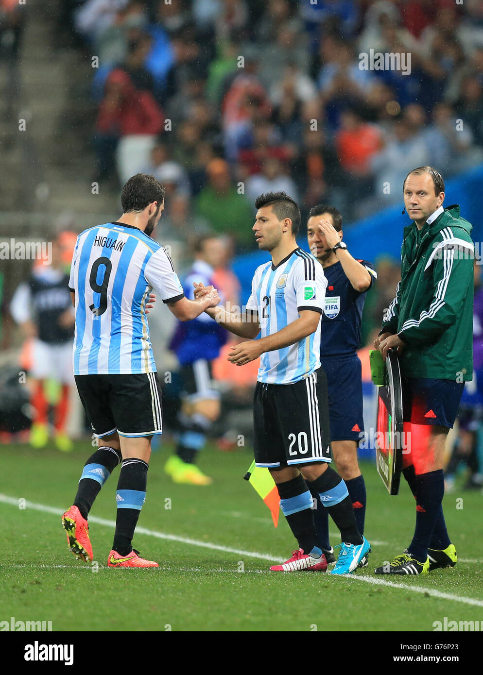 Soccer - FIFA World Cup 2014 - Semi Final - Netherlands v Argentina - Arena de Sao Paulo. Argentina's Gonzalo Higuain is substituted for Argentina's Sergio Aguero (right) Stock Photo
