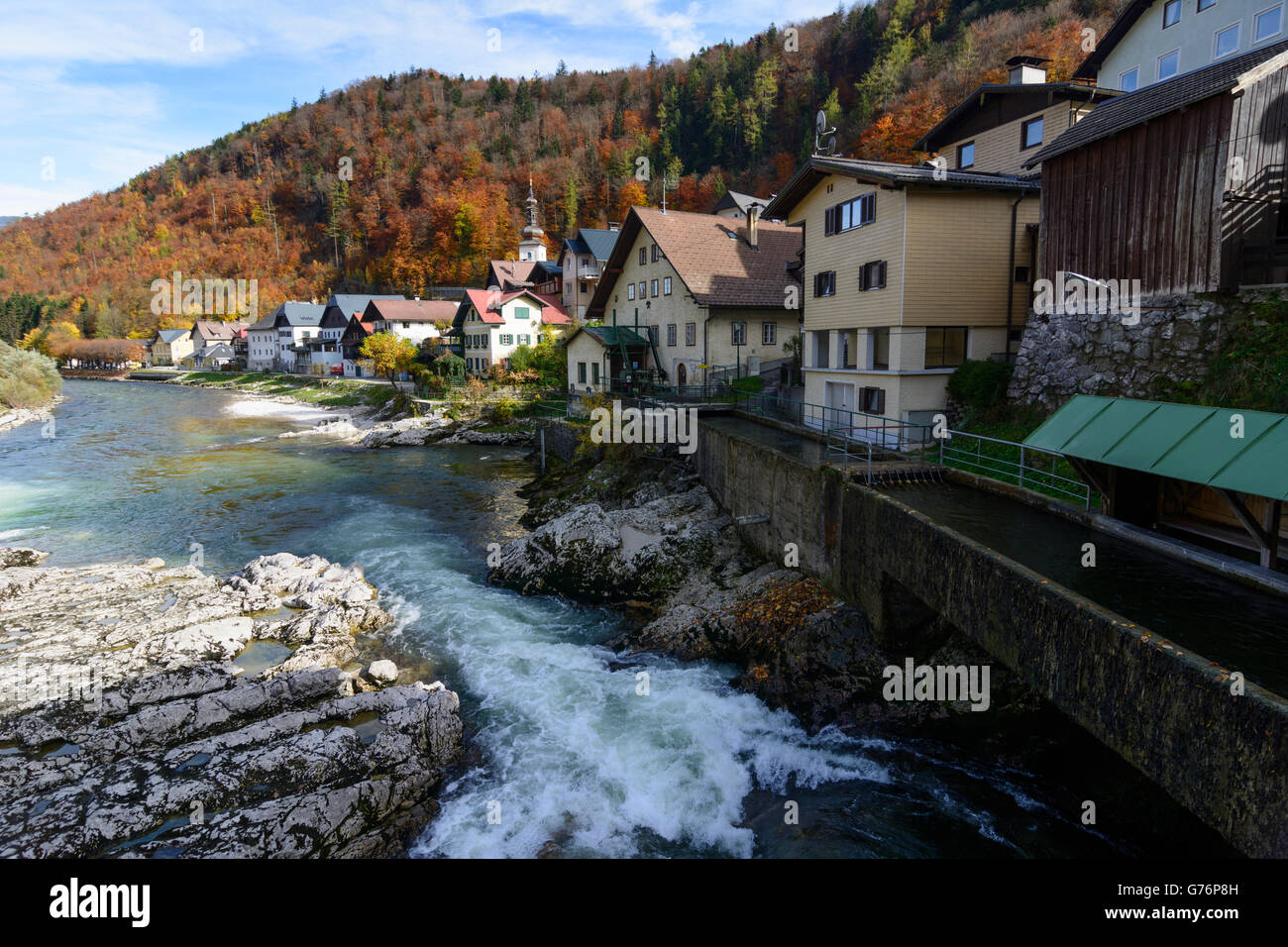 Traun River with houses of salt traders and parish church \