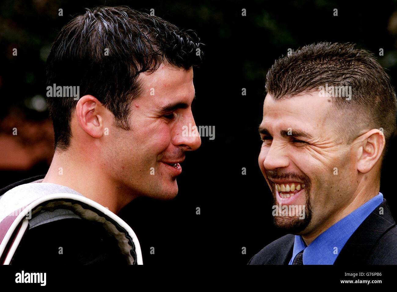 WBO Super-Middleweight Boxing Champion Joe Calzaghe (left) from Wales stands with his next challenger Miguel Jimenez from Puerto Rico, at a head to head press confrence at The Marriott Hotel in Cardiff, south Wales, prior to Saturday's bout at Cardiff Castle. Stock Photo
