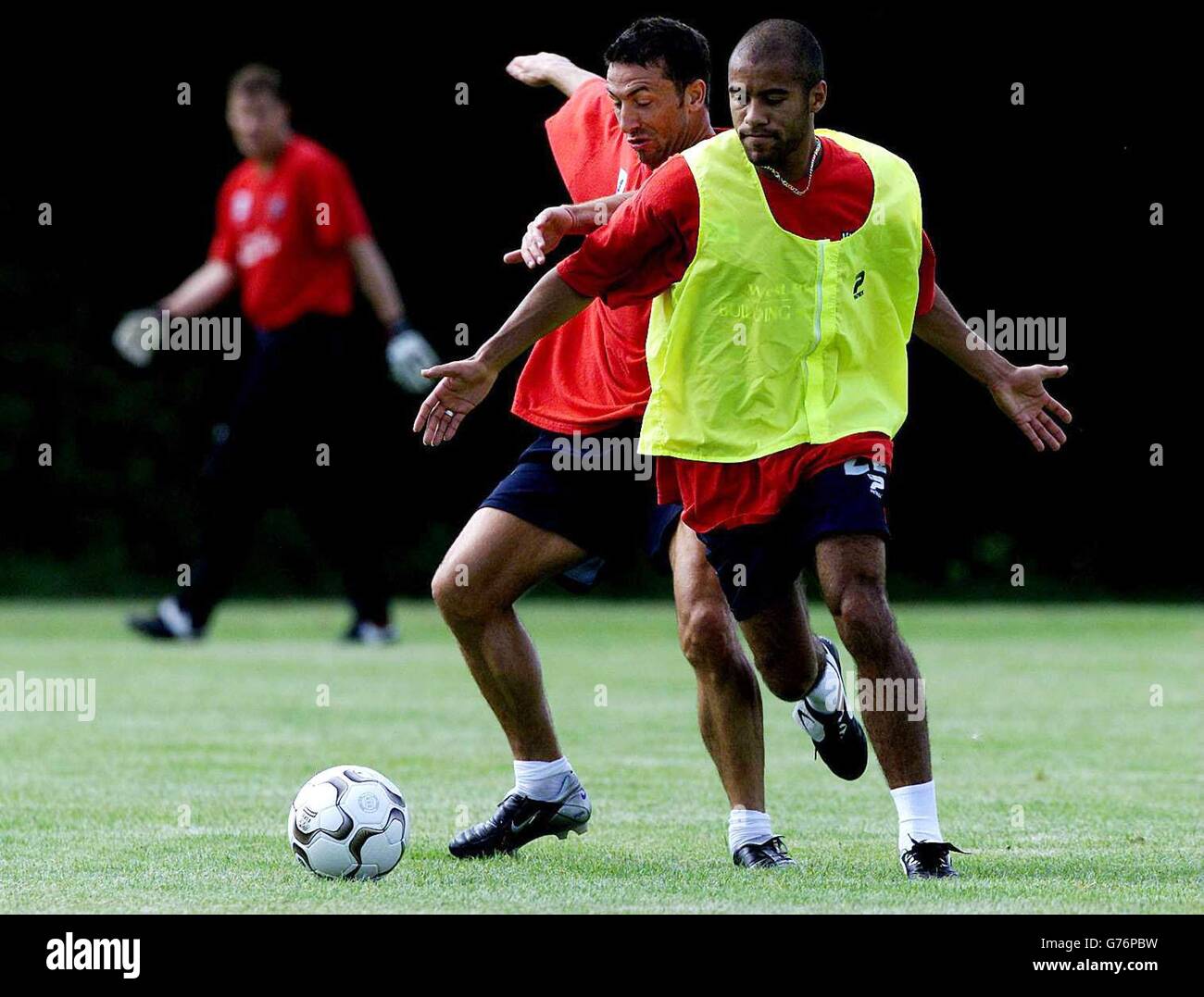 West Bromwich Albion captain Derek McInnes (left) hussles for the ball, protected by Adam Chambers (right) during training at Aston University Sports Ground, Birmingham prior to their opening game in the Premiership against Manchester United on Saturday at Old Trafford. Stock Photo