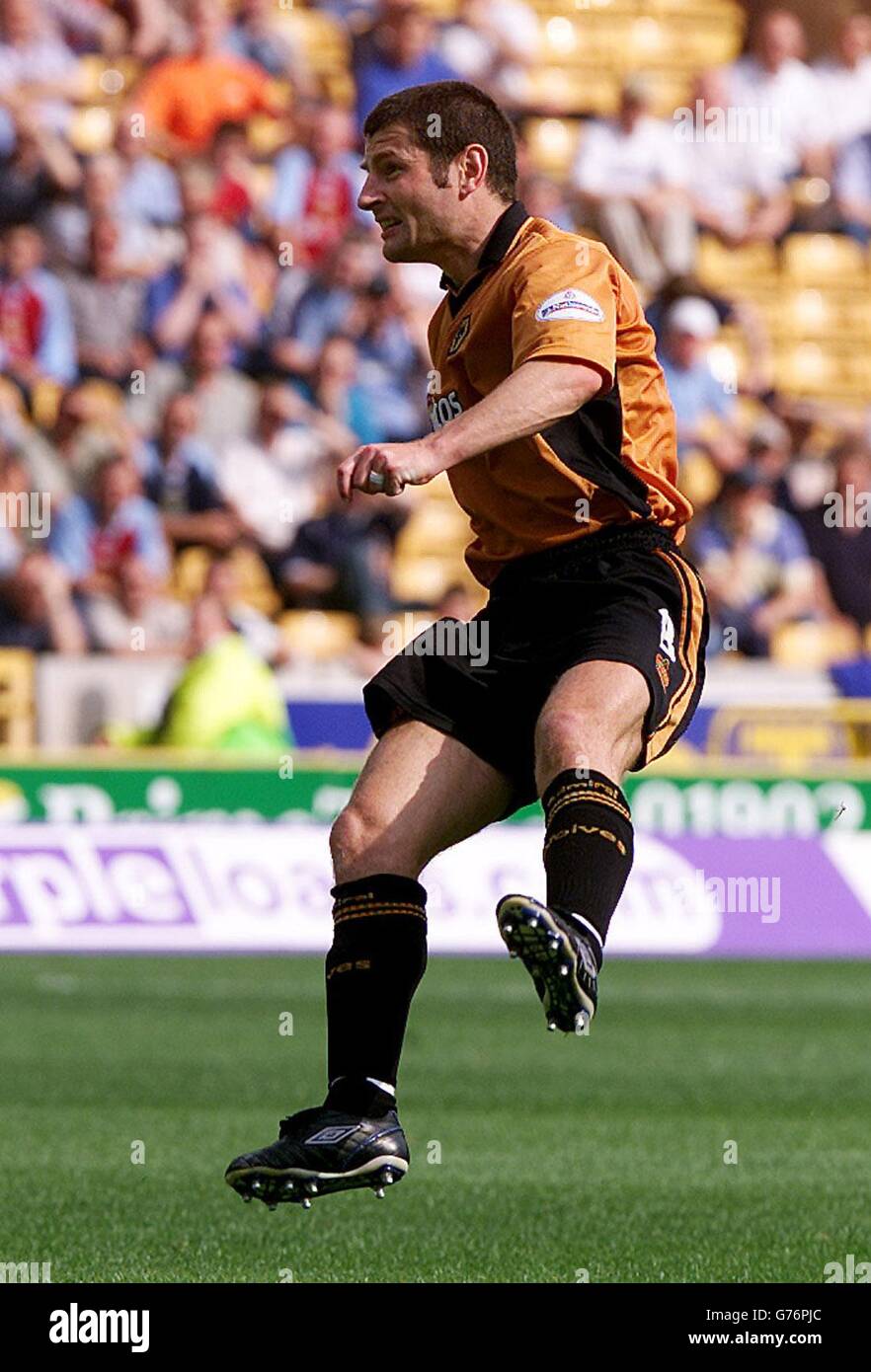 Wolverhampton Wanderers' Denis Irwin scores the 2nd Wolves goal from a free kick, against Burnley, during their Nationwide Division One match at Wolves' Molineux ground in Wolverhampton. . Stock Photo