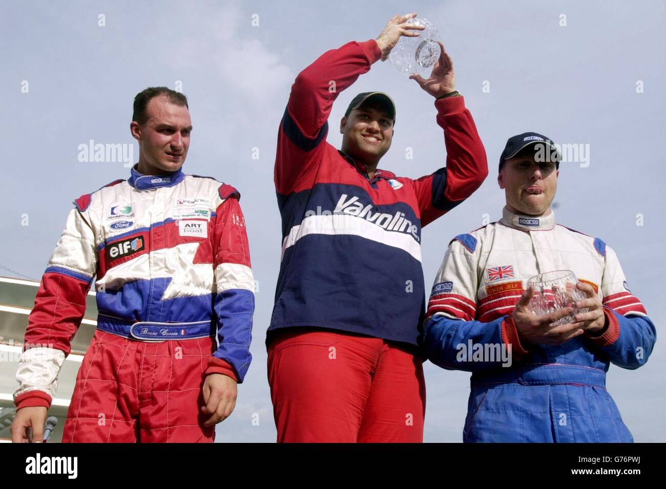 Christian Odd Sanne of Norway (centre) who won the British Powerboat Grand Prix in London's Docklands with Bruno Corsin of France (left) who came second and Britain's Owen Jelf who came third. Stock Photo