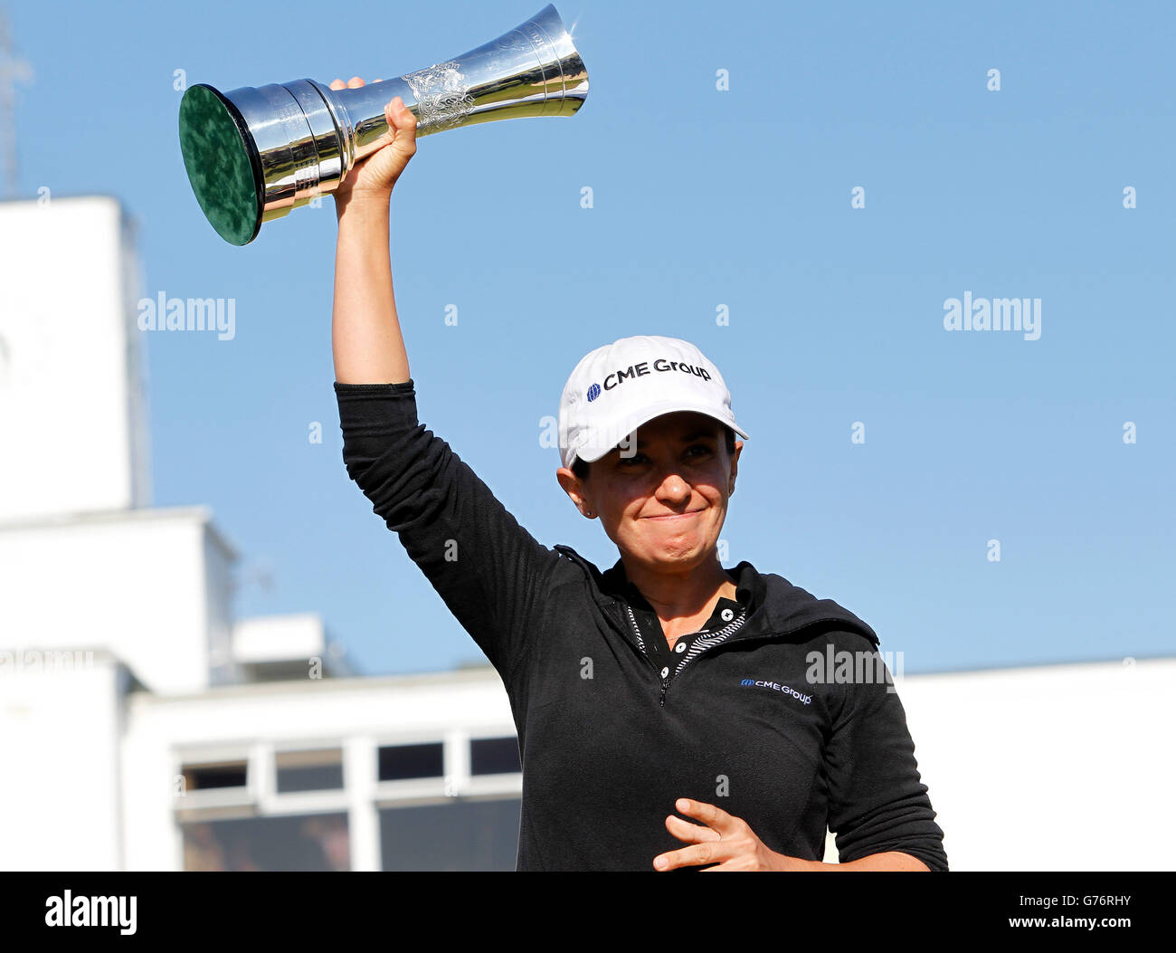 https://c8.alamy.com/comp/G76RHY/mo-martin-of-usa-with-the-british-open-trophy-during-day-four-of-the-G76RHY.jpg