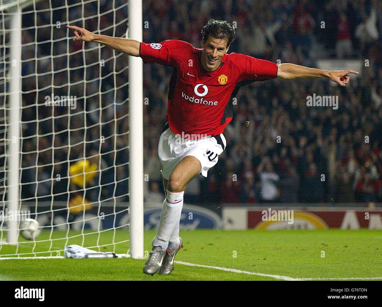 Manchester United's Ruud Van Nistelrooy celebrats scoring his goal against Maccabi Haifa, during their UEFA Champion's League Group F match betwen Manchester United and Maccabi Haifa at Old Trafford. Stock Photo