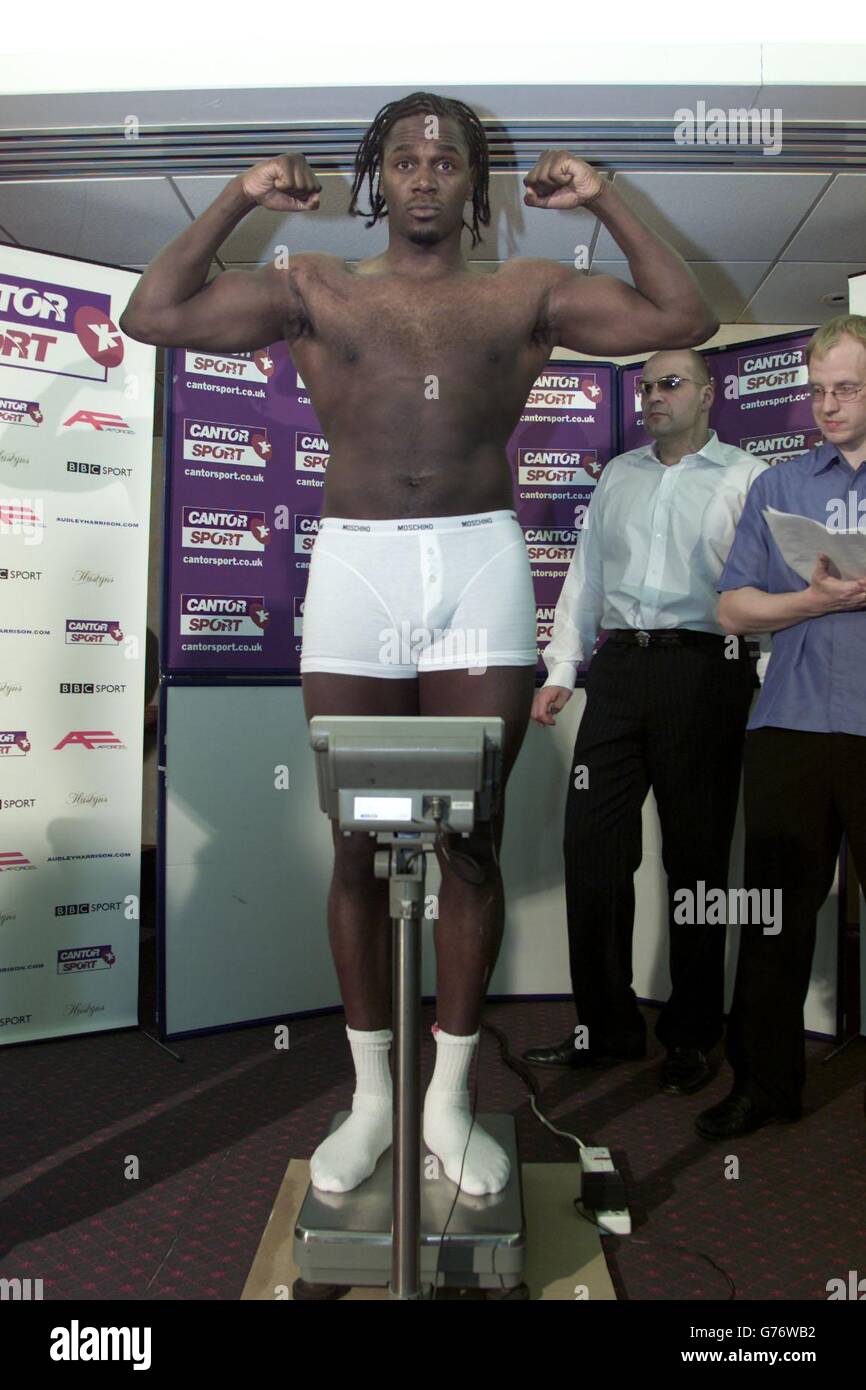 Britain's Audley Harrison tips the scales at 18 stones and 4 pounds at Wembley's Plaza Hotel, prior to his heavyweight bout with American Julius Long on Saturday 20th April, at Wembley Arena. Stock Photo