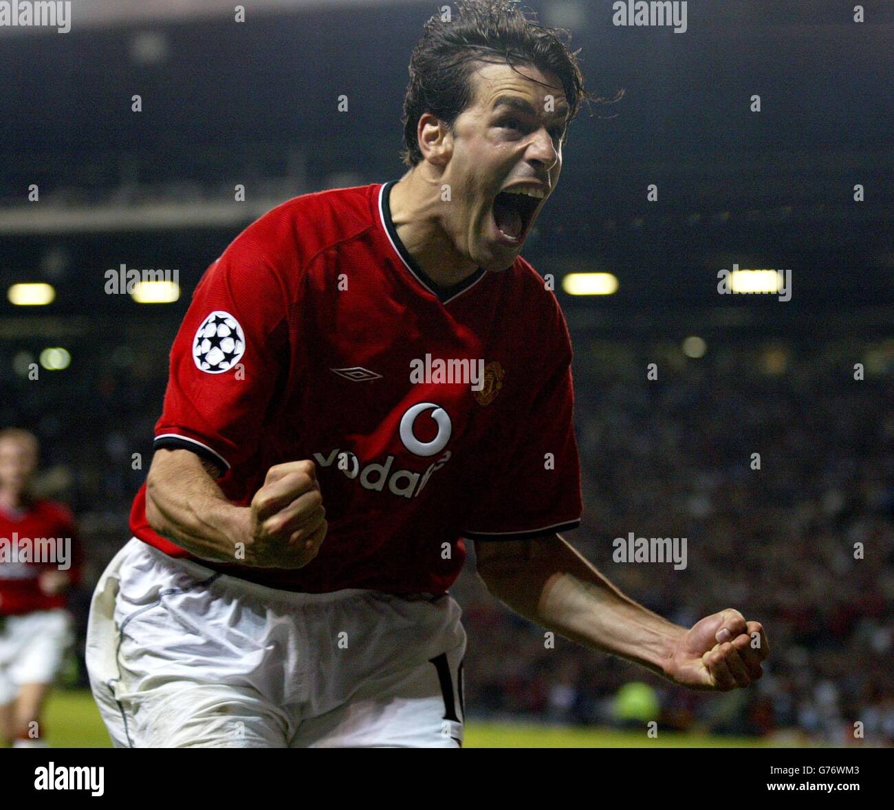 Manchester United's Ruud Van Nistelrooy celebrates after scoring his sides second goal against Bayer Leverkusen, during their Champions League semi-final first leg, at Old Trafford. Stock Photo