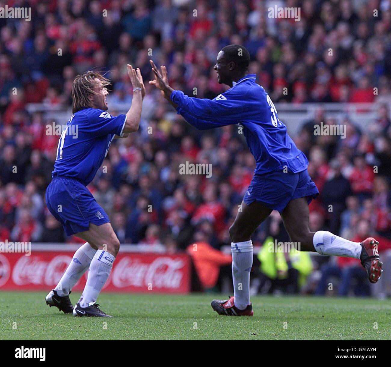 Chelsea's Carlton Cole (right) celebrates his goal with Boudewijn Zenden who later scored the 2nd during their FA Barclaycard Premiership match at Boro's Cellnet Riverside stadium. Stock Photo